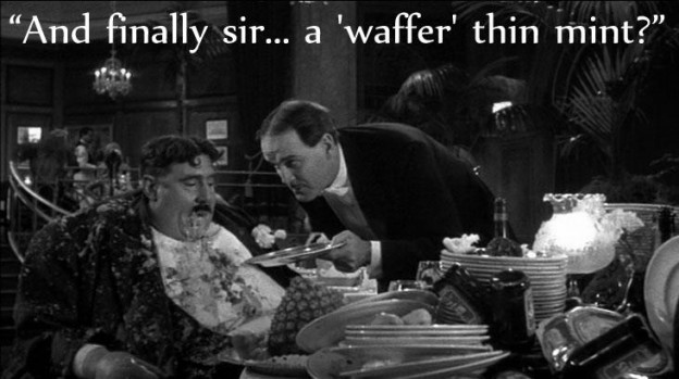 "Meaning of Life" still from "Mr. Creosote" skit: "And finally sir...a 'waffer' thin mint?"